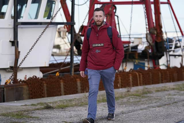 Jondy Ward, the skipper of a Scottish-registered scallop dredger, the Cornelis Gert Jan, arrives back at his boat