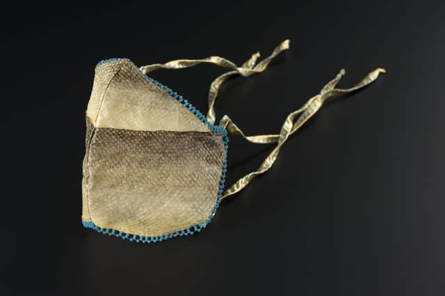 Masks from around the world at the exhibition include: a salmon skin mask from Alaska by Crystal Kaakeeyáa Rose Demientieff Worl