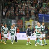 Celtic players walk off the field after the 1-1 draw with Shakhtar Donetsk at the Marshall Jozef Pilsudski's Municipal Stadium of Legia Warsaw. (Photo by Adam Nurkiewicz/Getty Images)