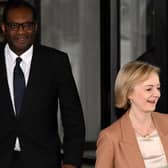 Liz Truss with  Kwasi Kwarteng (Photo by Oli SCARFF / AFP)