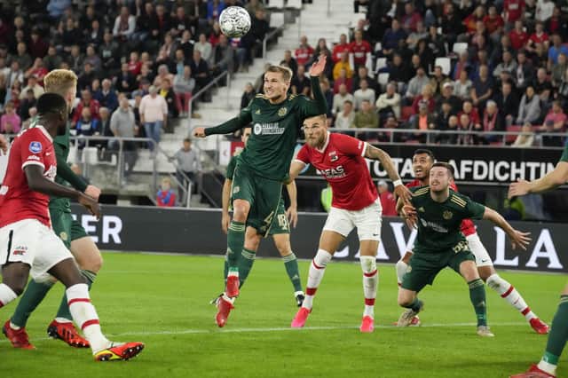 Celtic's Carl Starfelt clears the ball as AZ Alkmaar pile on pressure during the Europa League play-off second leg (AP Photo/Peter Dejong)