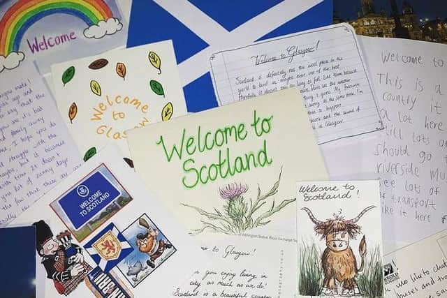 Members of the public who have donated to Refuweegee have been asked to write a note and leave a token of Scotland in the bundles to make refugees feel at home. Picture: Refuweegee