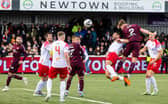 Frankie Kent heads home a late winner for Hearts against Spartans.
