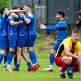 Spartans' Bradley Whyte (L) celebrates as his side are promoted to League Two after the Pyramid play-off final second leg between Albion Rovers and Spartans at Cliftonhill (Photo by Sammy Turner / SNS Group)