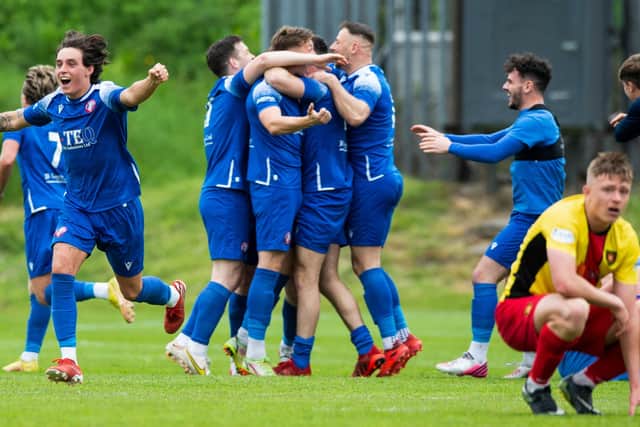 Spartans' Bradley Whyte (L) celebrates as his side are promoted to League Two after the Pyramid play-off final second leg between Albion Rovers and Spartans at Cliftonhill (Photo by Sammy Turner / SNS Group)