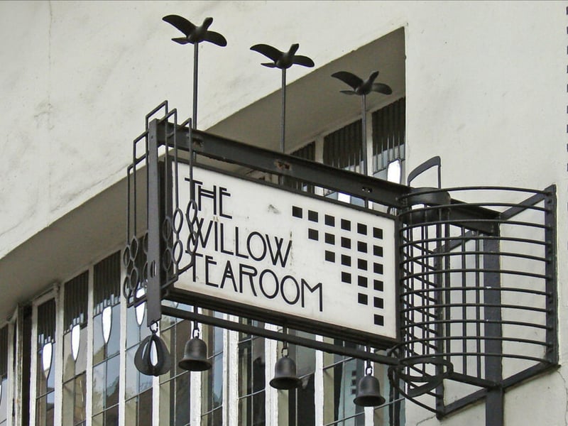 First opened by Miss Cranston and designed by Mackintosh in 1903, the original Willow Tea Rooms building can be found at 215-217 Sauchiehall Street in Glasgow. The name ‘Willow’ refers to the street name as ‘Saugh’ (from Sauchiehall) is Gaelic for ‘Willow Tree’.