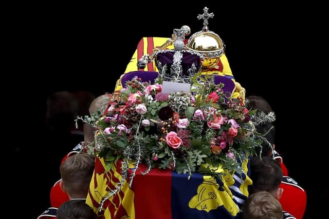 Coffin bearers carry the coffin of Queen Elizabeth II into St George's Chapel in Windsor Castle, Berkshire. Picture: PA