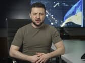 Ukrainian President Volodymyr Zelenskyy speaks from Kyiv, Ukraine, early on Saturday morning.  (Ukrainian Presidential Press Office via AP)