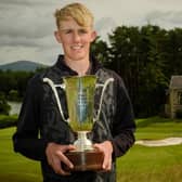 Elgin's Billy Devine shows off the trophy after winning the Scottish Boys' Championship at Lanark. Picture: Scottish Golf