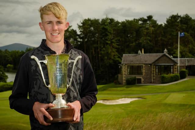 Elgin's Billy Devine shows off the trophy after winning the Scottish Boys' Championship at Lanark. Picture: Scottish Golf