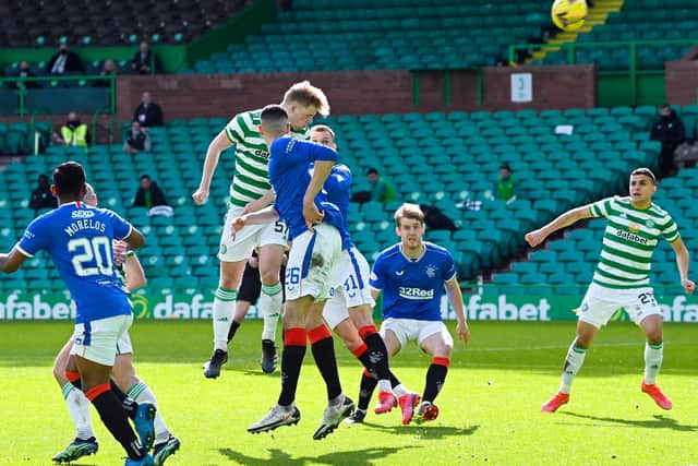 Celtic's Stephen Welsh (centre) has a headed chance during the 1-1 derby draw. (Photo by Rob Casey / SNS Group)