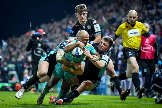 Tom O'Flaherty powers over for another Exeter Chiefs try against Glasgow. The winger scored a hat-trick. Photo: Andy Watts/INPHO/Shutterstock