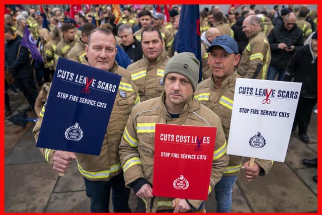 Members of the FBU protesting outside the Scottish Parliament. Image: Jane Barlow/Press Association.