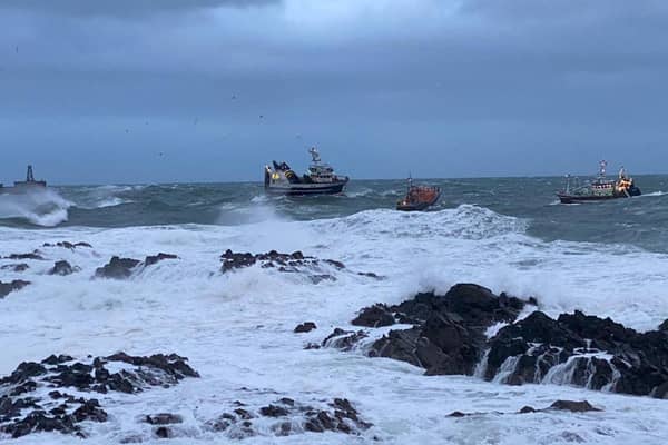 Peterhead Lifeboat rescue fishing vessel.