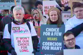 People take part in a demonstration at Old Palace Yard in Westminster, London, to oppose the Terminally Ill Adults (End of Life) Bill. PIC: Yui Mok/PA Wire