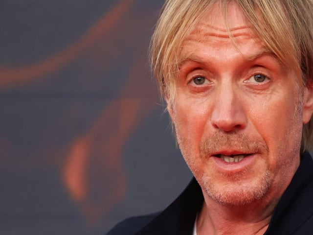 Harry Potter actor Rhys Ifans, who plays Otto Hightower in House of the Dragon, attends the premiere (Photo by HOLLIE ADAMS / AFP)