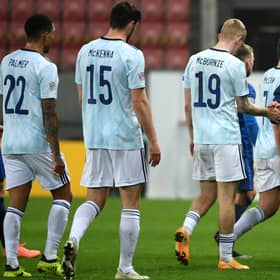 Scotland manager Steve Clarke shakes hands with his players after Sunday's defeat. Picture: PA