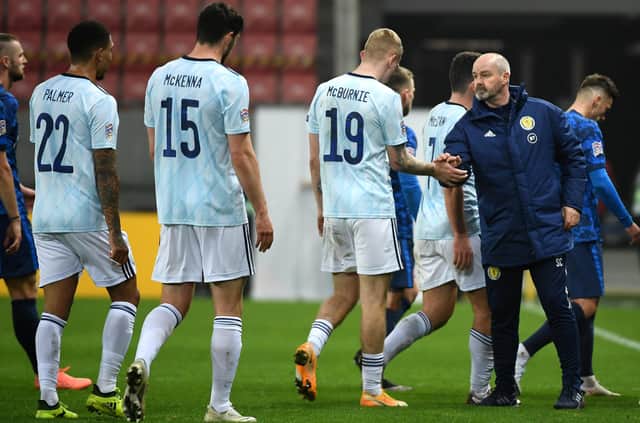 Scotland manager Steve Clarke shakes hands with his players after Sunday's defeat. Picture: PA