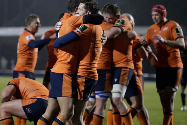 Henry Pyrgos of Edinburgh Rugby (r) and Ramiro Moyano celebrate on the final whistle against Saracens.