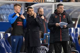Rangers Manager Giovanni van Bronckhorst speaks with Nathan Patterson during a UEFA Europa League match between Rangers and Sparta Prague at Ibrox . (Photo by Alan Harvey / SNS Group)