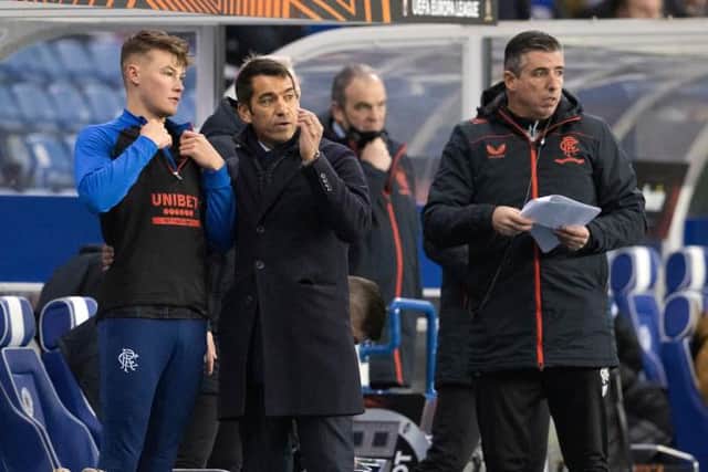 Rangers Manager Giovanni van Bronckhorst speaks with Nathan Patterson during a UEFA Europa League match between Rangers and Sparta Prague at Ibrox . (Photo by Alan Harvey / SNS Group)