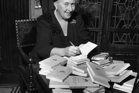 Agatha Christie signs French editions of her books, circa 1950 (Picture: Hulton Archive/Getty Images)