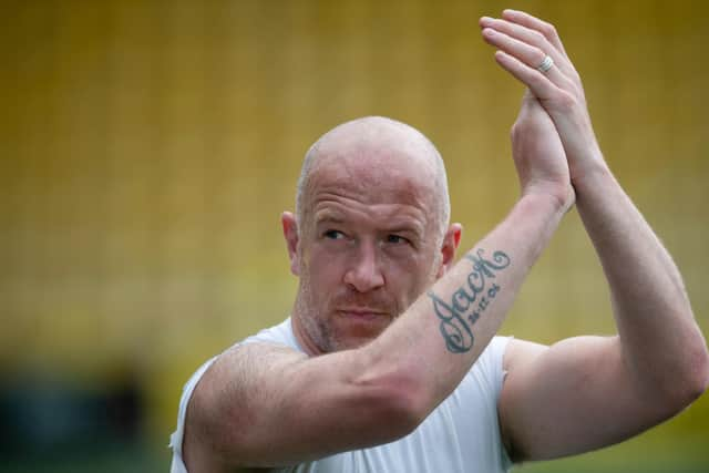 Dundee's Charlie Adam applauds the away support after the defeat at Livingston on the final day of the season. (Photo by Mark Scates / SNS Group)