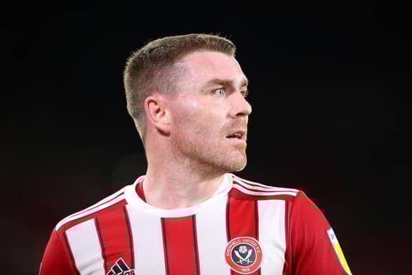 John Fleck was taken to hospital after a health scare on the pitch.