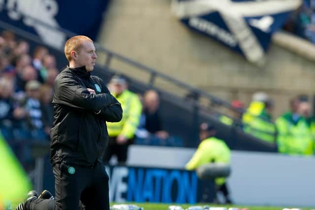 Neil Lennon drops to his knees as he looks on during the semi-final loss