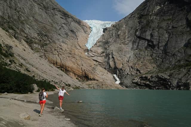 The Briksdal glacier near Olden, Norway, covered the lake in the foreground in 1997. Today it is approximately 150 meters above it (Picture: Sean Gallup/Getty Images)