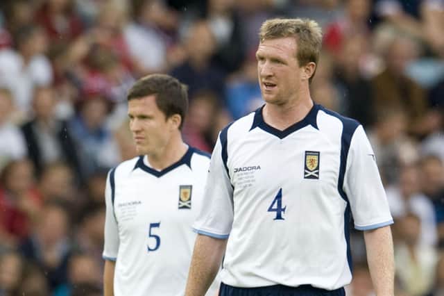 Scotland duo Gary Caldwell (left) and Steven Caldwell during the 4-0 defeat by Norway in Oslo in 2009.