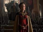 Rhaenyra Targaryen (Milly Alcock) stands in front of the Iron Throne in House of the Dragon (HBO)