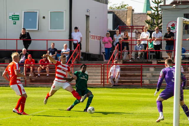 Bosun Lawal scores a debut goal for Celtic B but could not prevent a 2-1 defeat to Bonnyrigg Rose in their Lowland League opener. (Photo by Mark Scates / SNS Group)