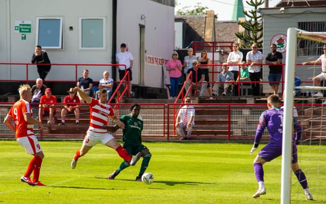 Bosun Lawal scores a debut goal for Celtic B but could not prevent a 2-1 defeat to Bonnyrigg Rose in their Lowland League opener. (Photo by Mark Scates / SNS Group)