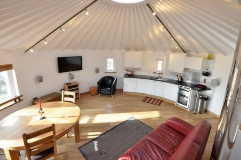 It's unlikely you've ever been in a room like the circular kitchen and living area before.
