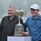 Bob MacIntyre poses with the trophy alongside his dad and caddie Dougie and girlfriend Shannon Hartley after winning the RBC Canadian Open at Hamilton Golf & Country Club on June 02, 2024 in Hamilton, Ontario, last weekend. Picture: Minas Panagiotakis/Getty Images.
