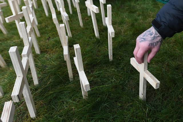 Crosses are planted in memory of drugs death victims at Springburn Parish Church, Glasgow