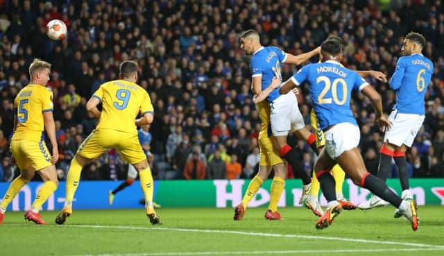 Leon Balogun opens the scoring for Rangers against Brondby at Ibrox but the defender had to limp off later in the match with a hamstring issue. (Photo by Craig Williamson / SNS Group)