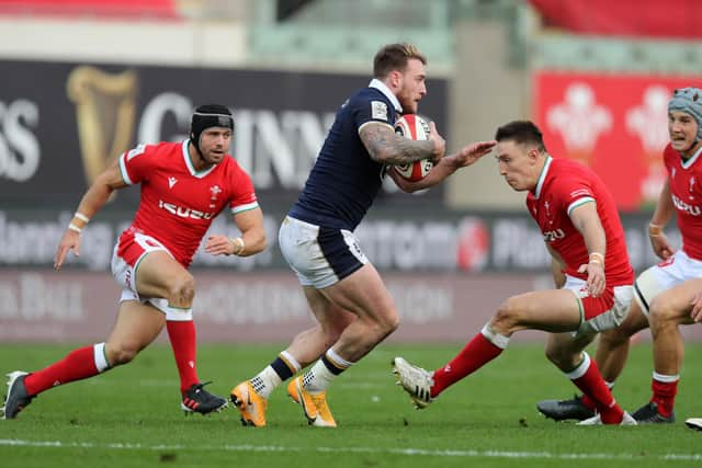 Stuart Hogg makes a break during Scotland's 14-10 win in Wales. Picture: David Rogers/Getty Images