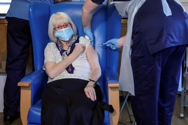 Resident Margaret Keating, 88, receiving the Pfizer/BioNTech COVID-19 vaccine at the Abercorn House Care Home in Hamilton.