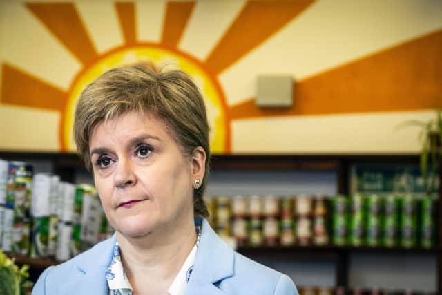 Scotland's First Minister Nicola Sturgeon at The People's Pantry food cooperative as part of the Scottish National Party (SNP) manifesto launch on April 8. Picture: Andy Buchanan - Pool/Getty Images