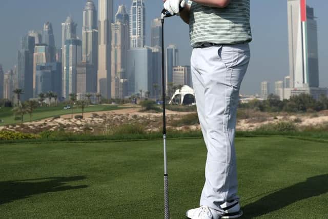 Bob MacIntyre pictured on the eighth tee at Emirates Golf Club during the Slync.io Dubai Desert Classic. Picrure: Warren Little/Getty Images.