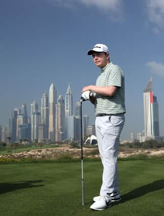 Bob MacIntyre pictured on the eighth tee at Emirates Golf Club during the Slync.io Dubai Desert Classic. Picrure: Warren Little/Getty Images.