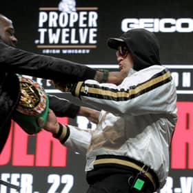 Deontay Wilder and Tyson Fury get into an altercation during their press conference at the MGM Grand Las Vegas (Photo: JOHN GURZINSKI/AFP via Getty Images)