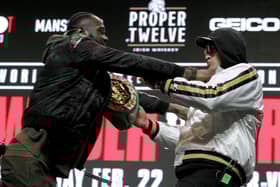 Deontay Wilder and Tyson Fury get into an altercation during their press conference at the MGM Grand Las Vegas (Photo: JOHN GURZINSKI/AFP via Getty Images)