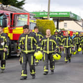 Members of the Emergency services leave scene of an explosion at a petrol station in Creeslough