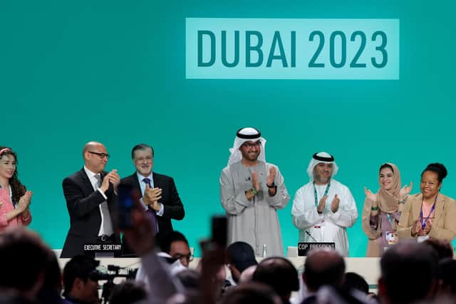 "We have the basis to make transformational change happen," COP28 president Sultan Ahmed Al Jaber, from the UAE, said at the UN climate summit in Dubai before the deal was adopted by consensus - prompting delegates to rise and applaud. Picture: Giuseppe Cacace/Getty Images
