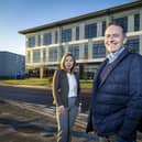OEG’s office manager Toto Sanderson and CEO John Heiton outside the firm’s new HQ in Dyce.
