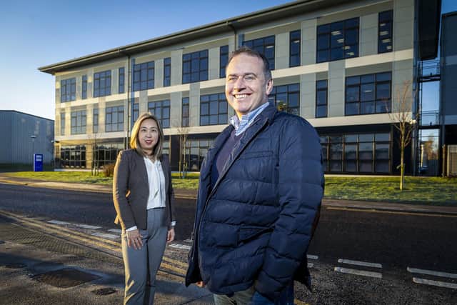 OEG’s office manager Toto Sanderson and CEO John Heiton outside the firm’s new HQ in Dyce.