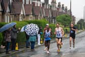 Runners take part in the Full Edinburgh Marathon in the rain. Picture: Andy O'Brien